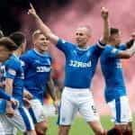 The Rangers kit with 32Red sponsorship visible on the front.