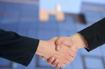 Business people shaking hands.