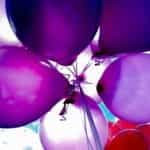 A bunch of purple balloons.