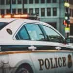 A police car parked with its lights on.